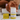 A lady holing a tube of Lemongrass, lime & Patchouli deodorant balm for sensitive skin